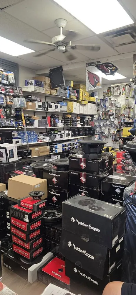 Showroom wall stocked with car stereos, speakers and install parts at Sound Image