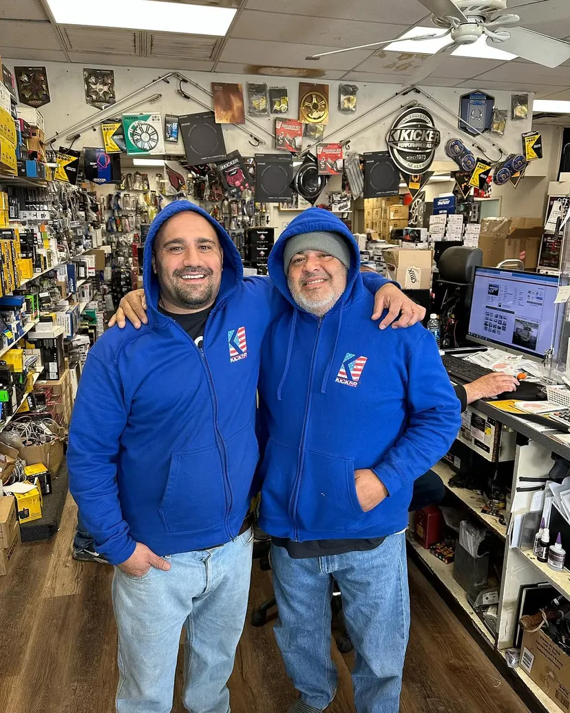 The Sound Image team at the counter of the Phoenix car audio showroom